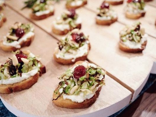 Photo of Crostini with baked Brussels sprouts