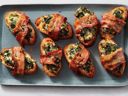 Photo of spinach crostini wrapped in bacon