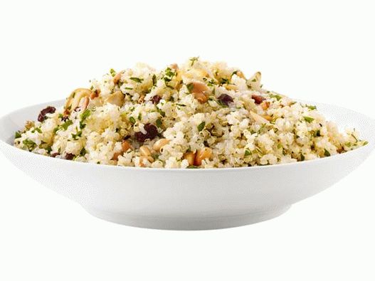 Photo of quinoa cereal with garlic, pine nuts and raisins
