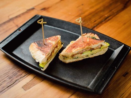 Photo of a Cuban caramelized pork sandwich