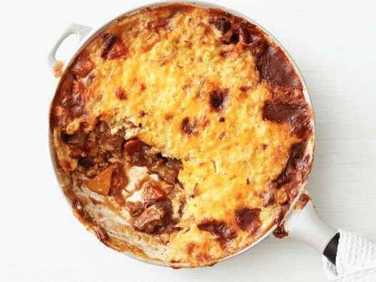 Photo Corn casserole with pumpkin and beef in a slow cooker