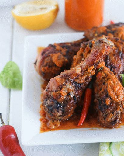Photo of grilled chicken in marinade