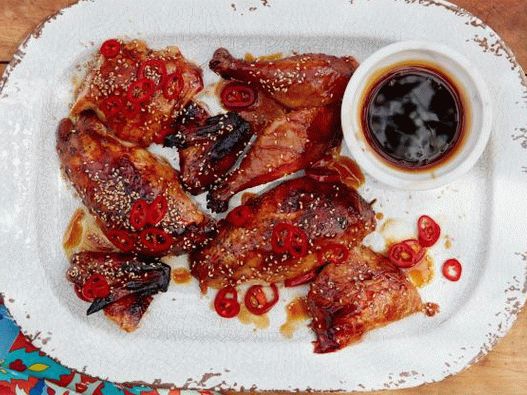Photo Chicken on a jar in a glaze of Coca-Cola with soya-garlic sauce