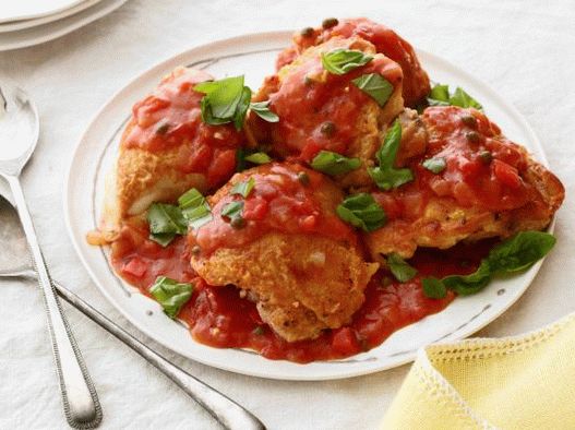 Photo Hunting chicken with sauce and vegetables