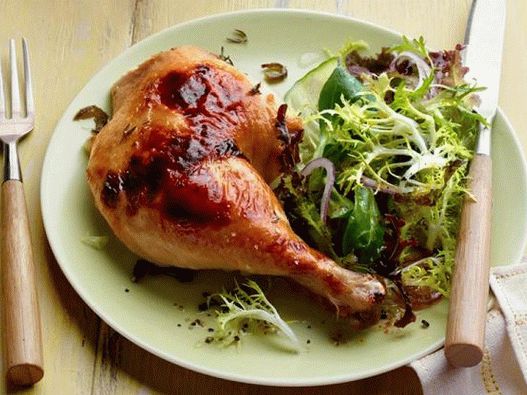 Photo of a chicken in a honey-lime marinade in the oven