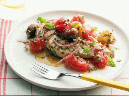 Photo of grilled chicken breast with pickled cherry tomatoes