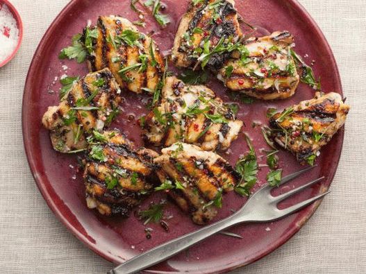 Photo of chicken thighs in a grilled marinade