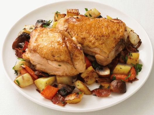 Photo Chicken thighs with vegetable stew
