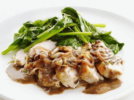 Photo of chicken roast in the oven with rosemary