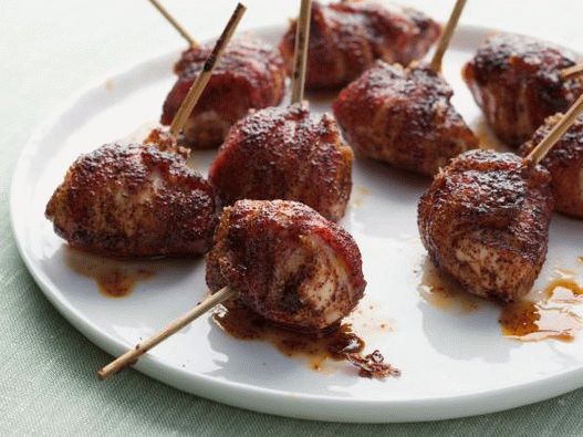 Photo of chicken rolls wrapped in bacon