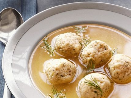 Photo Chicken stock with matzo dumplings