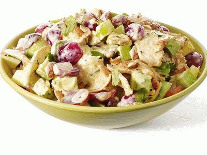 Photo Chicken salad with grapes, cashews and apples