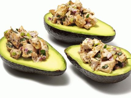 Photo Chicken Salad in Halves of Avocado
