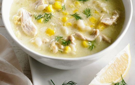 Photo Chicken soup with corn and orzo paste