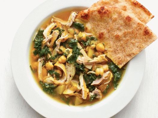 Photo Chicken soup with turnips and chickpeas