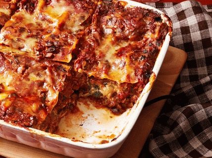 Photo Lasagna with spinach and mushroom stew