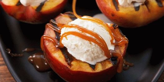 Grilled peaches with honey-orange butter cream and toasted almonds