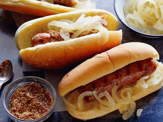 Hot dogs with grilled sausages in beer