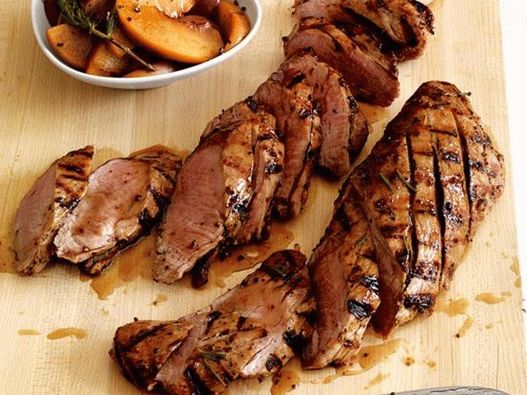 Grilled pork tenderloin with peaches and mustard-rosemary sauce