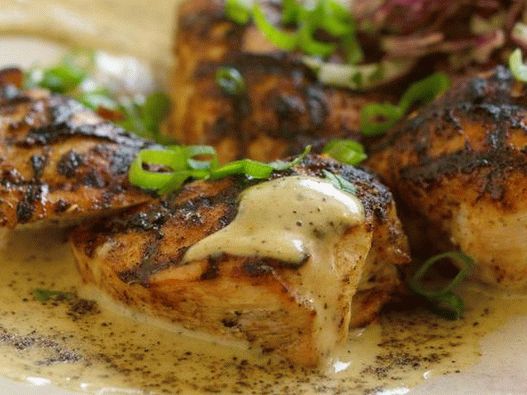 Chicken breast in a mixture of 16 spices on the grill and cabbage salad with hot pepper