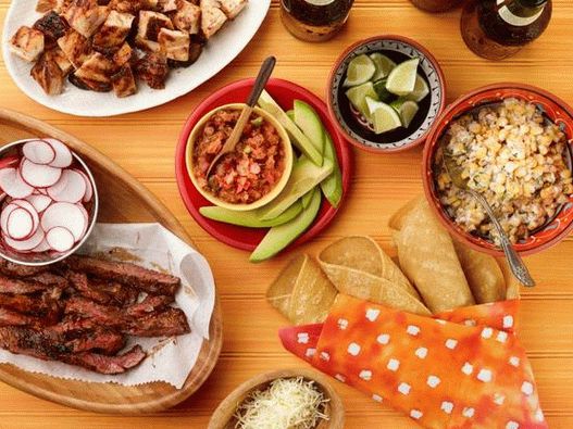 Grilled taco bar with chicken and steak in orange glaze