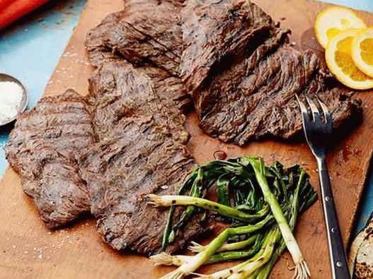 Grilled steak in beer marinade