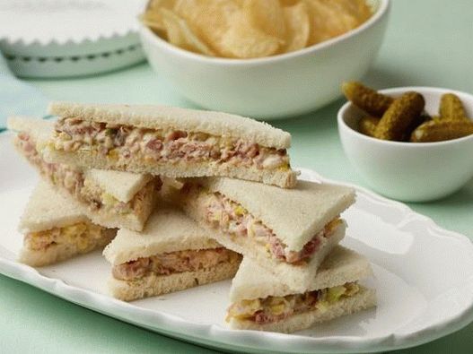 Sandwich with ham and pickled cucumbers