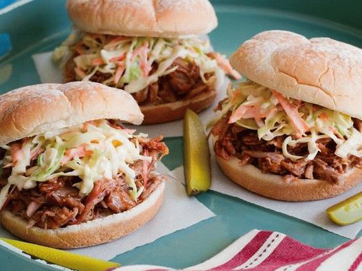 Ragged pork on buns with Cole Slaw salad