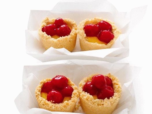 Photo of the dish - Lemon cakes in bowls of meringue with cherries