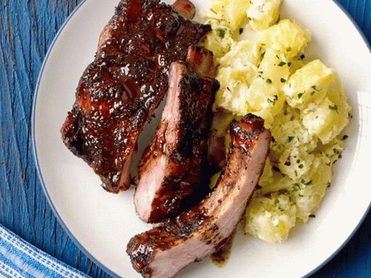 Pork ribs in sweet tea glaze with potato and lemon salad