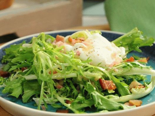 Frize salad with poached egg and bacon