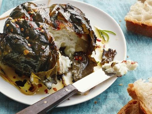 Grilled goat cheese in grape leaves