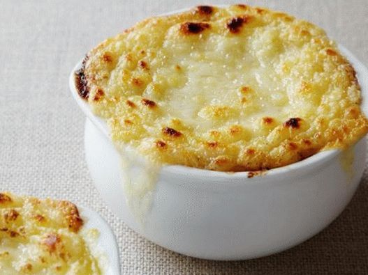 French onion soup under a bread cap