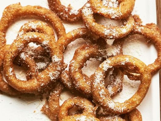 Photo Onion rings with cheese in batter