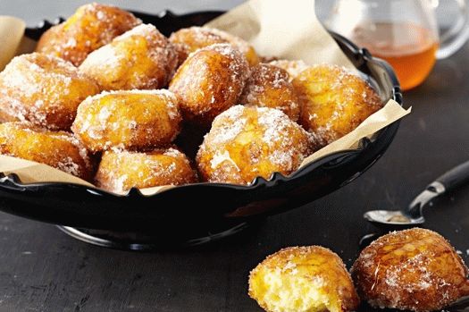 Photo of Lucumades (donuts with honey and cinnamon)