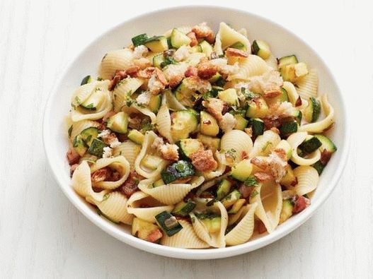 Photo of pasta shells with zucchini and bacon