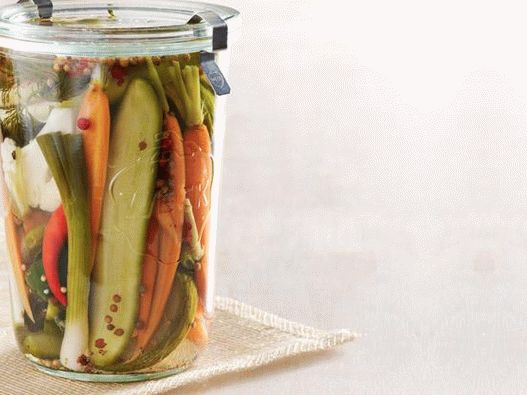 Photo Salted vegetables in the refrigerator: cauliflower, carrots, cucumbers