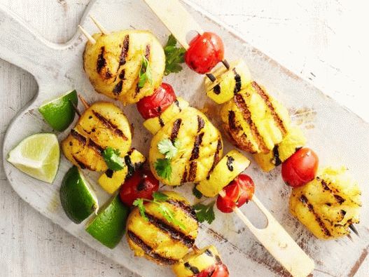 Photo of scallops and yellow grilled zucchini with curry seasoning