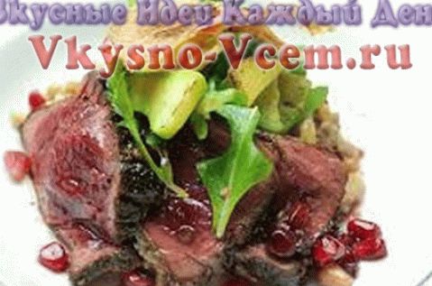 Ostrich meat with quince and spices and pomegranate