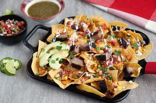 Photo of Nachos with roast beef in barbecue sauce