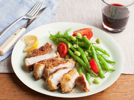 Photo Natural pork loin cutlets in cheese breading