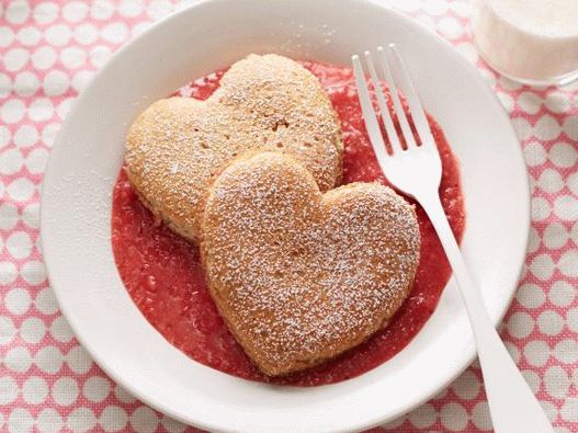Photo of Whole-grain pancakes with strawberry sauce