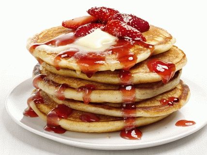Photo Cream cheese fritters with strawberry sauce