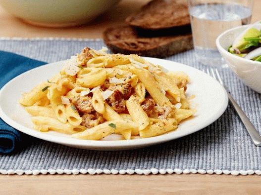 Photo of the dish - Pasta in sausage and pumpkin sauce with leaf lettuce
