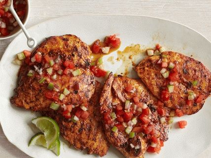 Photo of Spicy chicken breast grilled with salsa sauce