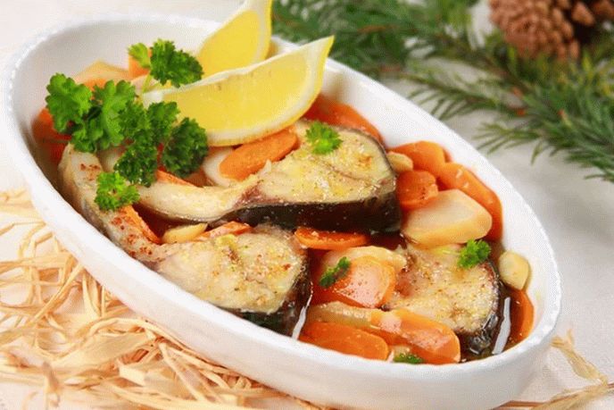 Boiled carp with vegetables