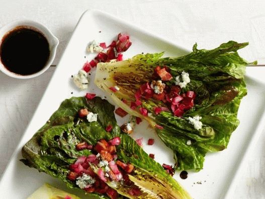 Grilled baked romaine salad with blue cheese and bacon