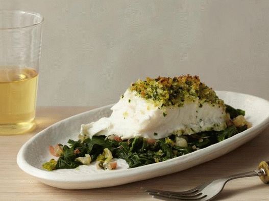 Photo Halibut in a crispy breading with a chard in the oven