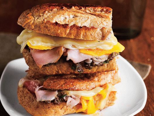 Photo of focaccia panini with brie and prosciutto cheese