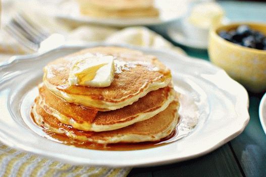 Photo of Pancake on kefir with pecans and syrup